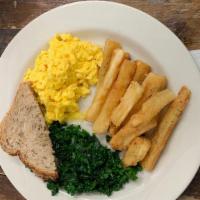 Scrambled Organic Eggs · Served with sautéed spinach, multi grain toast and a side of yucca fries.