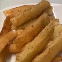 Yucca Fries · Yucca pan fried with our delicious homemade aioli dipping sauce