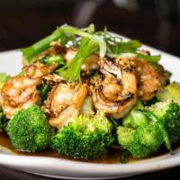 Roasted Garlic & Vegetables · Sautéed in garlic sauce on a bed of steamed broccoli.