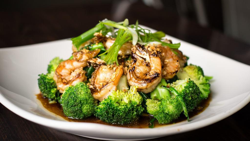 Roasted Garlic & Vegetables · Sautéed in garlic sauce on a bed of steamed broccoli.