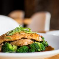 Grilled Teriyaki Chicken Breast · Steamed broccoli mushroom served with brown rice.