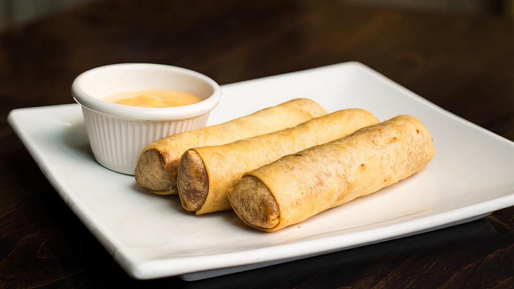 Kale Mixed Crispy Spring Rolls · Vegetarian. Kale, Carrot, basil, cabbage, vermicelli with lime-mustard seed sauce.