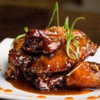 Chicken Wings · Spicy. With tamarind chili sauce.