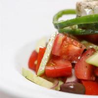 Horiatiki · Classic Greek Salad in a red wine vinaigrette