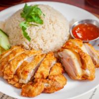 Hainan Fried Chicken Rice / 海南炸鸡饭 · Famous fried crispy chicken served with sweet chili sauce. Serve with house special soup. / ...