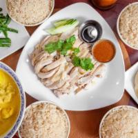 Family Order For Three To Four People / 合适三至四个人的套餐 · Roti canai, large Hainan chicken, sautéed string bean, large curry chicken, and 4 chicken ri...