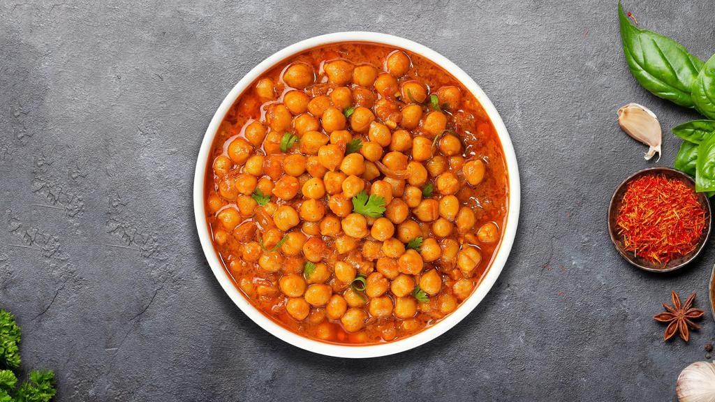 Champ'S Chana Masala · Chickpeas cooked in a tomato and onion gravy with Indian spices.