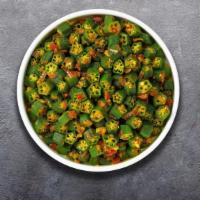 Achari Bhindi · Freshly cut okra cooked with tomatoes & fried onions.