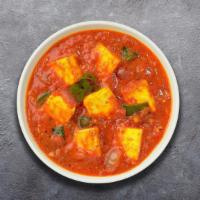 Key To Kadahi Paneer · Vegan cheese, bell pepper, onion, ginger, and garlic.