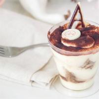Tiramisu · Italian Dessert!! Mascarporne , lady finger soaked in coffee and Khalua
and sprinkle with co...