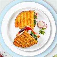 Mid Eastern Panini · Hummus, roasted pepper, grilled zucchini, eggplant, mozzarella cheese, with olive.