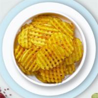 Waffle Shuffle Fries · Idaho potatos sliced in an alternating waffle pattern, fried until golden brown, and garnish...