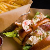 New England Lobster Roll & Fries · Maine lobster meat with fresh lemon juice, mayonnaise. celery. parmesan truffle fries