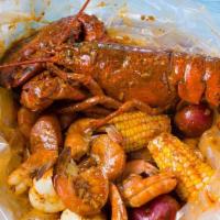 Whole Lobster Combo · 1.25LB Whole Maine lobster with choice of 1 lb of Crawfish, Green Mussels, Black Mussels, Cl...