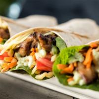 Buffalo Wrap · Delicious wrap made with breaded chicken cutlet, spicy Buffalo sauce, fresh romaine lettuce,...