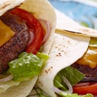 Burger Wrap · Delicious beef patty, lettuce, tomatoes, onions, and american cheese.