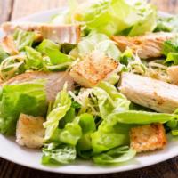 Chicken Caesar Salad  · Juicy grilled chicken, romaine, croutons, parmesan cheese, and mixed greens.