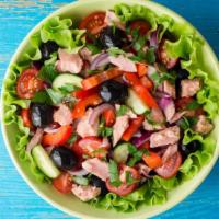 Tuna Salad  · Fresh tuna, romaine, olives, carrots, tomatoes, and cucumbers.