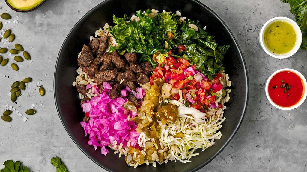 Carne Asada Bowl · Create your Carne Asada bowl with all-natural flank steak, your choice of Tributo toppings, and two sauces.