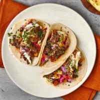 Beef Barbacoa Taco · Create your Beef Barbacoa taco with 24 hour braised short rib, your choice of Tributo toppin...