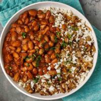 Cauliflower Rice And Beans · Cauliflower rice and house-made pozole beans.