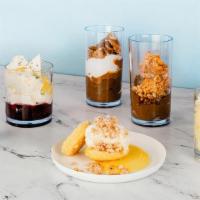 Half Doz Assortment · The ultimate selection of all your favorite puds and messes.