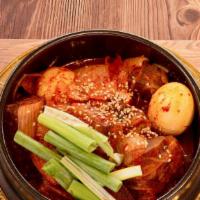 매운갈비찜 / Spicy Gal Bi Jjim · Braised beef short ribs with radish and onion in spicy sauce. Comes with one 16oz rice.