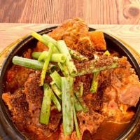 감자탕 / Gamja Tang · Pot stew with pork, potato and Chinese cabbage. Comes with one 16oz rice.