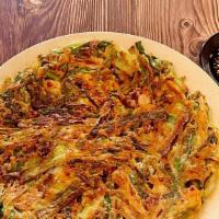 해물파전 / Haemul Pa Jeon · Korean style pancake with assorted seafood and scallion.
