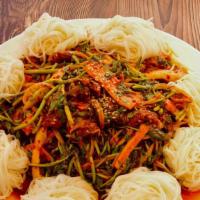 골뱅이무침 / Gol Baeng Yi Muchim · Seasoned topshell with vegetables.