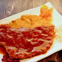 돈까스 / Tonkatsu · Deep fried breaded pork loin with special brown sauce on the side. Comes with one 8oz rice.