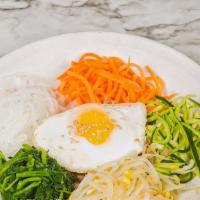 비빔밥 / Bibimbap · Assorted vegetables with ground beef and fried egg. Comes with one 16oz rice.