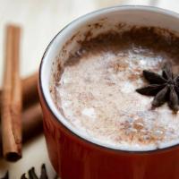 Chai Latte · Black tea infused with clove, ginger, star anise and other spices swirled with steamed milk....