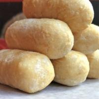 Tequeños · Cheese sticks wrapped in wheat flour dough.