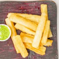 Yuca Fries · Vegan. Yuca (Cassava) and guasacaca sauce.