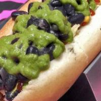 Zambo Hot Dog · Vegan. Black beans, sweet plantains, onions, cabbage, chips, ketchup, mustard, and guasacaca...