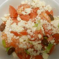 Horiatiki Salad (Small) · Tomato salad with cucumber, onion, pepper, feta and olives.