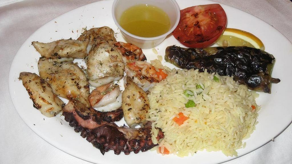 Grilled Seafood · Combination of shrimp, calamari and octopus.