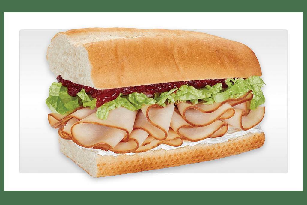 Turkey Cranberry · Oven-roasted turkey, whipped cream cheese and lettuce with Cranberry on your choice of bread.