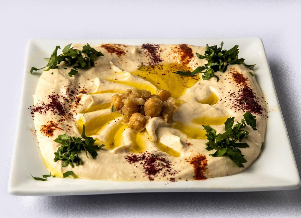 Hummus · Chickpea puree with lemon, garlic, tahini & olive oil.