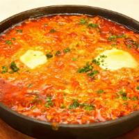 Shakshuka · Mediterranean plum tomato sauce,peppers, onions,mozzarella,cooked with eggs. Also served wit...
