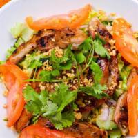 Grilled Chicken Salad 烤鸡沙拉 · Fresh daikon radish, carrots, iceberg lettuce, cucumber, tomatoes, mint leaves, and red onio...