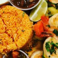 Camarones Al Ajillo · Shrimp sautéed in garlic sauce. Served with rice and mixed vegetables.