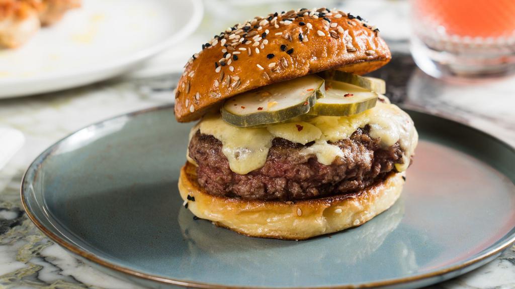 Dry Aged Beef Burger · Hot Pickles & Aged Cheddar