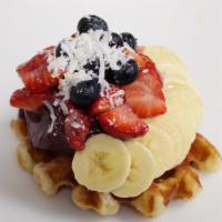 Waffle Package  · Hot Belgian Waffle, topped with a cool scoop of the blend of your choice, strawberries, bana...