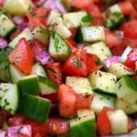 Shepherd Salad · Chopped fresh tomatoes, peppers, cucumbers, onions, parsley, olive oil, and vinegar dressing...