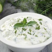 Cacik · A lasly dip of yogurt made with cucumber, salt, garlic, and mint.