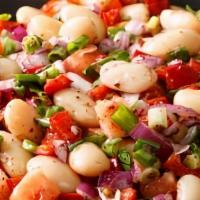 White Bean Salad · White beans mixed with red onions, parsley, tomatoes, fresh red pepper, olive oil, and vineg...