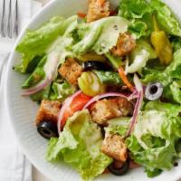 Garden (Vegetarian) Salad · Sliced fresh lettuce, cucumber, tomatoes, greens salad mix, and onions topped with olive oil...