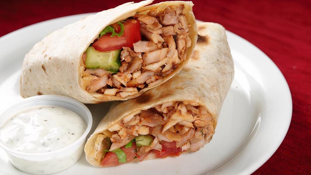 Chicken Gyro Sandwich · Thinly sliced chicken gyro with lettuce, tomatoes, and onions.